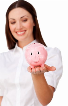 simsearch:400-04184165,k - Focus on a piggybank against a white background Stock Photo - Budget Royalty-Free & Subscription, Code: 400-04187480