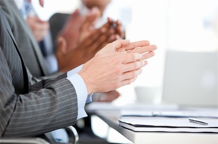 simsearch:400-05710382,k - Close-up of a businessteam applauding a presentation in the office Photographie de stock - Aubaine LD & Abonnement, Code: 400-04187806