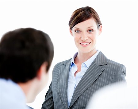 simsearch:400-05710382,k - Portrait of a confident businesswoman talking at her colleague during a meeting in the office Photographie de stock - Aubaine LD & Abonnement, Code: 400-04187814