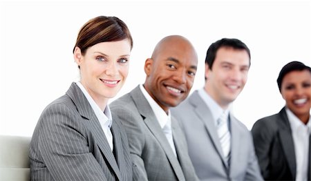 simsearch:400-05710386,k - Portrait of smiling business team during a presentation against a white background Stock Photo - Budget Royalty-Free & Subscription, Code: 400-04187861
