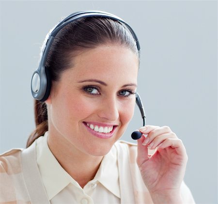 simsearch:400-05287143,k - Close-up of a businesswoman with headset on in the office Stock Photo - Budget Royalty-Free & Subscription, Code: 400-04188636