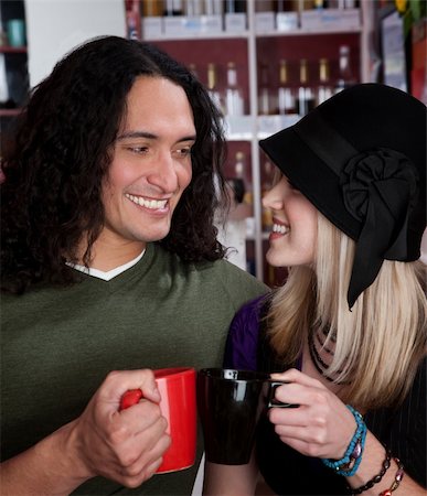 Interracial couple together at a coffee house Stock Photo - Budget Royalty-Free & Subscription, Code: 400-04188830