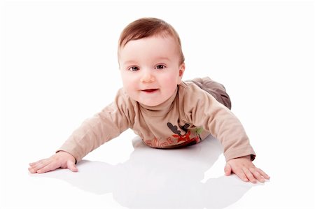 simsearch:400-04594888,k - Portrait of an adorable 6 months old baby boy smiling. White background, studio shot. Stock Photo - Budget Royalty-Free & Subscription, Code: 400-04181008