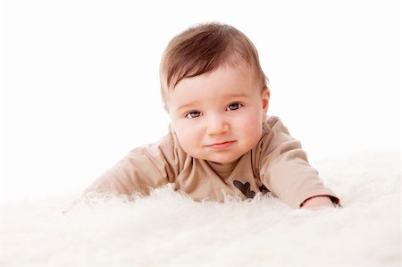 simsearch:400-04594888,k - Portrait of an adorable little 6 months old baby with sad face. White background, studio shot. Stock Photo - Budget Royalty-Free & Subscription, Code: 400-04181013