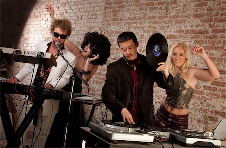 simsearch:400-04206686,k - Jammin at a 1970s Disco Music Party Stock Photo - Budget Royalty-Free & Subscription, Code: 400-04182342