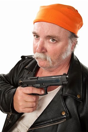 simsearch:400-06396523,k - Big tough guy with orange bandanna and a pistol Stock Photo - Budget Royalty-Free & Subscription, Code: 400-04182366