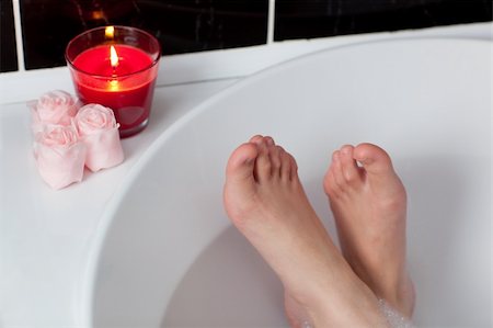 Bathtime. Girl's feet standing in bath tub. Stock Photo - Budget Royalty-Free & Subscription, Code: 400-04182715