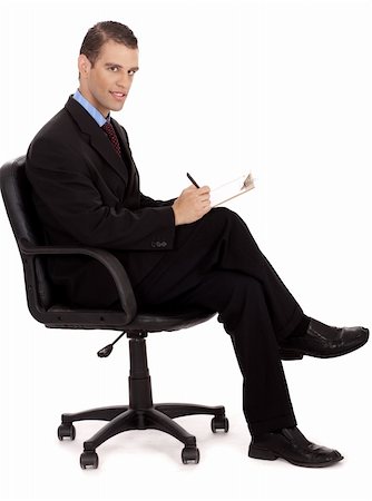 professional business men taking notes sitting in the wheel chair on a white background Stock Photo - Budget Royalty-Free & Subscription, Code: 400-04182728