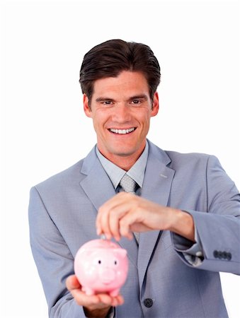 simsearch:400-04184165,k - Charismatic businessman saving money in a piggy-bank against a white background Stock Photo - Budget Royalty-Free & Subscription, Code: 400-04183087