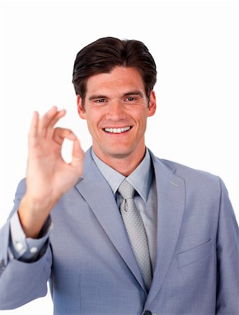 simsearch:400-04875087,k - Successful businessman showing OK sign against a white background Photographie de stock - Aubaine LD & Abonnement, Code: 400-04183116