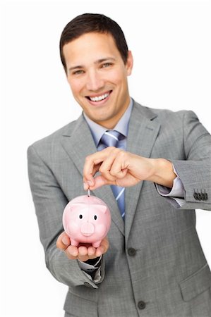 simsearch:400-04184165,k - Cheerful businessman saving money in a piggy-bank against a white background Stock Photo - Budget Royalty-Free & Subscription, Code: 400-04183125