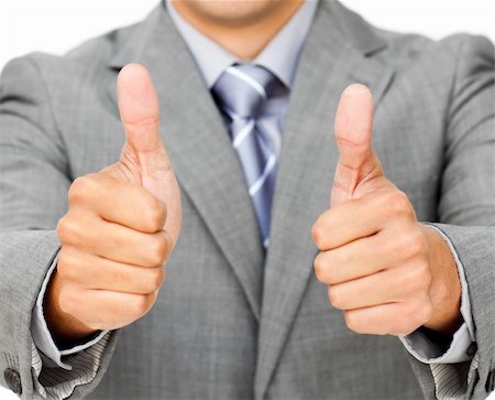 simsearch:400-04875087,k - Close-up of a businessman with thumbs up isolated on a white background Photographie de stock - Aubaine LD & Abonnement, Code: 400-04183133