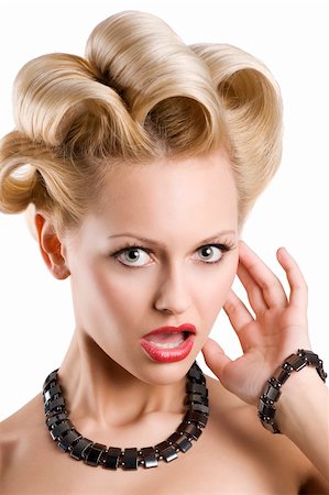 simsearch:877-07460478,k - cute blond woman with creative hair stylish wearing a black necklace and bracelet over white making funny face Stock Photo - Budget Royalty-Free & Subscription, Code: 400-04183375