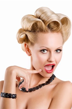 simsearch:877-07460478,k - cute blond woman with creative hair stylish wearing a black necklace and bracelet making funny face Stock Photo - Budget Royalty-Free & Subscription, Code: 400-04183371
