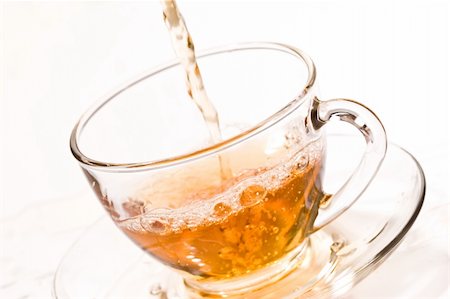 drink series: pouring tea into glassy tea cup Stock Photo - Budget Royalty-Free & Subscription, Code: 400-04183621