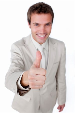 simsearch:400-04875087,k - Successful businessman with thumb up against a white background Photographie de stock - Aubaine LD & Abonnement, Code: 400-04183743