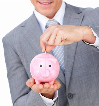 simsearch:400-04184165,k - Close-up of a businessman saving money in a piggybank against a white background Stock Photo - Budget Royalty-Free & Subscription, Code: 400-04183969