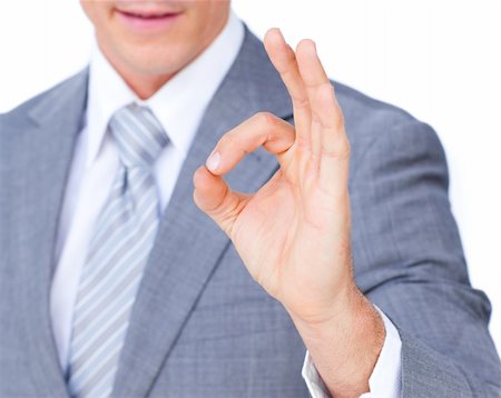 simsearch:400-04875087,k - Close-up of a businessman showing OK sign isolated on a white background Photographie de stock - Aubaine LD & Abonnement, Code: 400-04183997