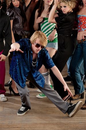 simsearch:400-04206686,k - Break dancing pose at a 1970s Disco Music Party Stock Photo - Budget Royalty-Free & Subscription, Code: 400-04194171