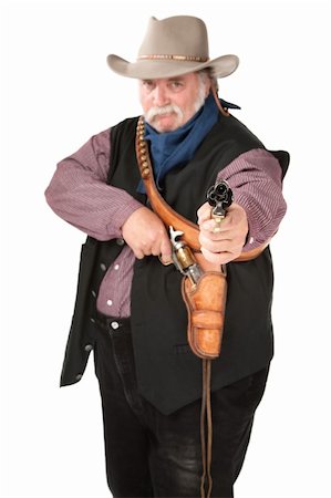 Big cowboy pointing pistol on white background Stock Photo - Budget Royalty-Free & Subscription, Code: 400-04194207