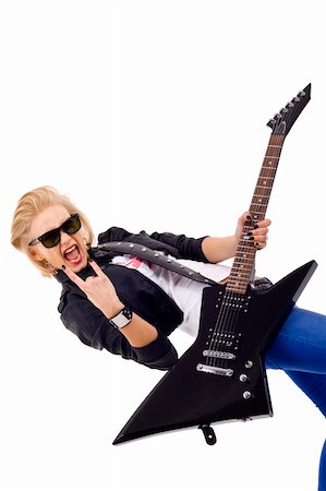 simsearch:400-04652753,k - picture of an energic blond girl wearing glasses and playing a guitar Stock Photo - Budget Royalty-Free & Subscription, Code: 400-04194534