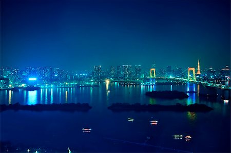 The landscape of Rainbow Bridge and the city which are night at a tourist spot in Tokyo Stock Photo - Budget Royalty-Free & Subscription, Code: 400-04194758
