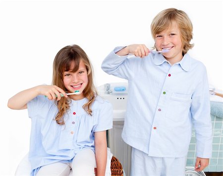 Cute children brushing their teeth at home Stock Photo - Budget Royalty-Free & Subscription, Code: 400-04196890
