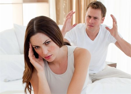 Pessimistic couple having an argument  in the bedroom Stock Photo - Budget Royalty-Free & Subscription, Code: 400-04197318