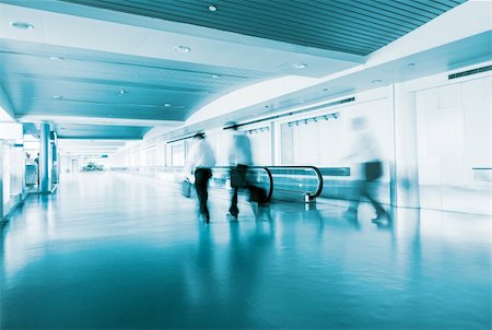 People Walking in Airport Tunnel with moving walkway, long exposure Stock Photo - Budget Royalty-Free & Subscription, Code: 400-04197499