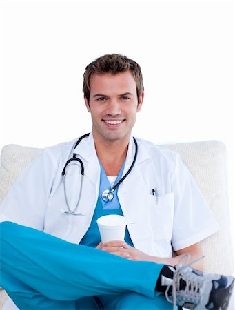 food specialist - Charming male doctor drinking coffee in the staff room against a white background Photographie de stock - Aubaine LD & Abonnement, Code: 400-04197794