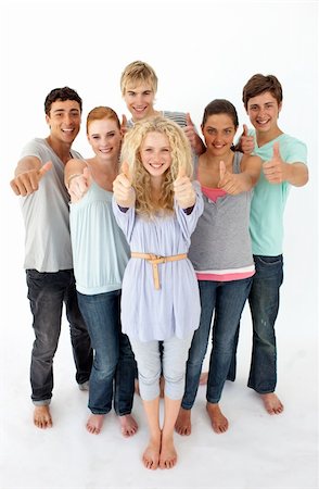 simsearch:400-04199223,k - Group of teenagers standing and smiling in front of the camera with thumbs up Stock Photo - Budget Royalty-Free & Subscription, Code: 400-04199179