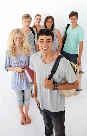 simsearch:400-04199223,k - Teenagers going through the high school against wite background Stock Photo - Budget Royalty-Free & Subscription, Code: 400-04199199