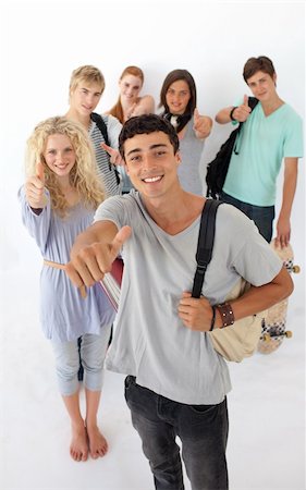 simsearch:400-04199223,k - Teenagers going through the high school against wite background Stock Photo - Budget Royalty-Free & Subscription, Code: 400-04199202