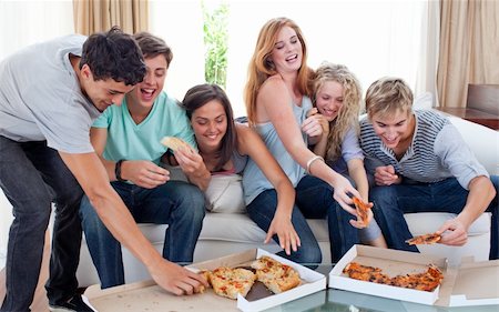 simsearch:400-04199223,k - Jolly adolescents eating pizza at home Stock Photo - Budget Royalty-Free & Subscription, Code: 400-04199218