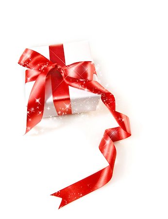 simsearch:400-04304378,k - Gift box wrapped with red satin ribbon on white Photographie de stock - Aubaine LD & Abonnement, Code: 400-04199932
