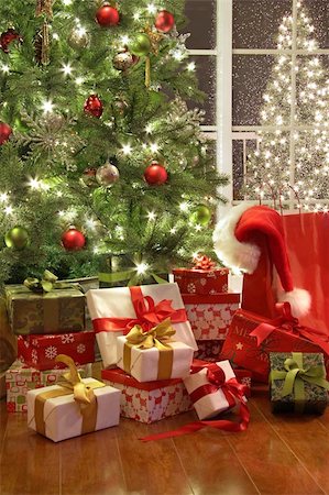 santa window - Brightly lit christmas tree with lots of gifts near window Stock Photo - Budget Royalty-Free & Subscription, Code: 400-04199944