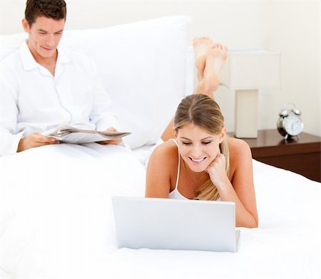 simsearch:400-04195864,k - Cute couple surfing on the internet at home Stock Photo - Budget Royalty-Free & Subscription, Code: 400-04190073