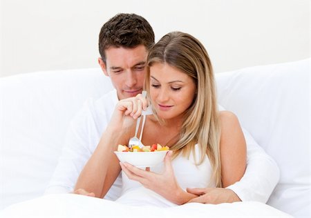 simsearch:400-04195864,k - Caucasian couple having breakfast against a white background Stock Photo - Budget Royalty-Free & Subscription, Code: 400-04190080