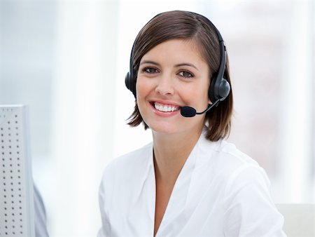 simsearch:400-05287143,k - Portrait of a pretty customer agent at work in the office Stock Photo - Budget Royalty-Free & Subscription, Code: 400-04192229