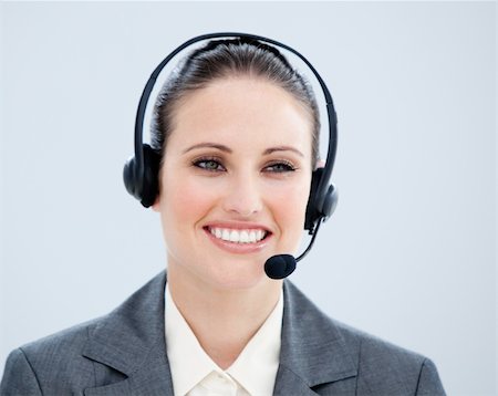 simsearch:400-05287143,k - Smiling businesswoman with headset on Stock Photo - Budget Royalty-Free & Subscription, Code: 400-04192272
