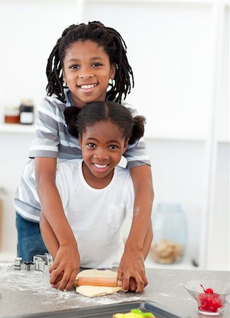 simsearch:846-02794589,k - Adorable brother and sister cooking biscuits in the kitchen Stock Photo - Budget Royalty-Free & Subscription, Code: 400-04192518