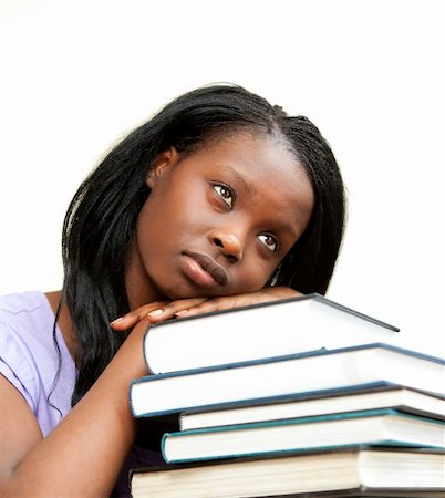 simsearch:400-04206778,k - Student leaning on a stack of books against a white background Foto de stock - Super Valor sin royalties y Suscripción, Código: 400-04206171