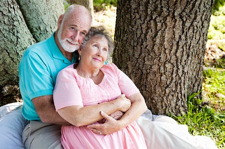 simsearch:400-04208630,k - Nostalgic senior couple sitting outdoors and remembering. Stock Photo - Budget Royalty-Free & Subscription, Code: 400-04209017