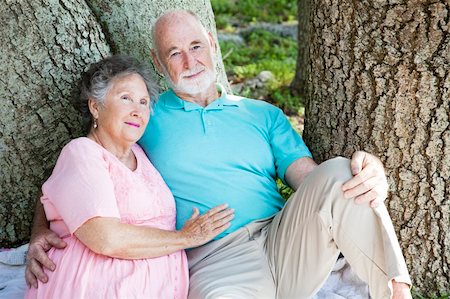 simsearch:400-04208630,k - Senior couple relaxing together in the park under a tree. Stock Photo - Budget Royalty-Free & Subscription, Code: 400-04209019