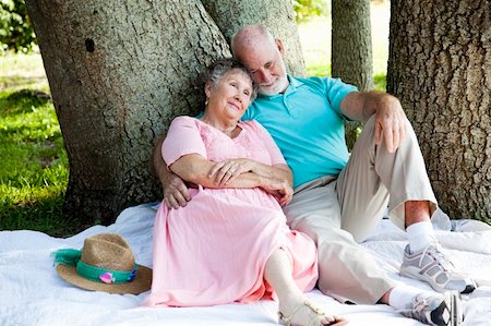 simsearch:400-04208630,k - Beautiful senior couple relaxes in the shade at the park. Stock Photo - Budget Royalty-Free & Subscription, Code: 400-04209011