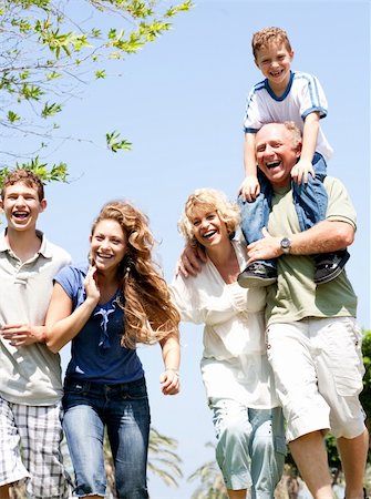 simsearch:400-07426233,k - Happy family having fun in the park with three children Stock Photo - Budget Royalty-Free & Subscription, Code: 400-04209156