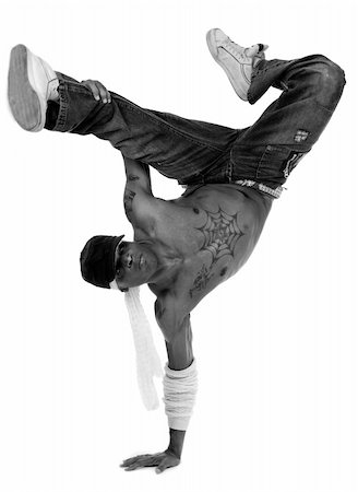 Hip hop dancer freezed his movements on isolated white background Stock Photo - Budget Royalty-Free & Subscription, Code: 400-04209259