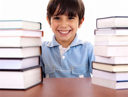 excited kids on first day of school - Smiling young school boy surrounded by books on white background Stock Photo - Budget Royalty-Free & Subscription, Code: 400-04209291