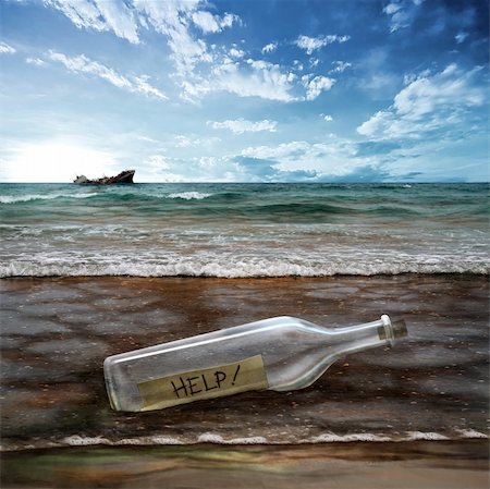 ship in a bottle - Help message in a bottle with background contaminated sea Stock Photo - Budget Royalty-Free & Subscription, Code: 400-04201570