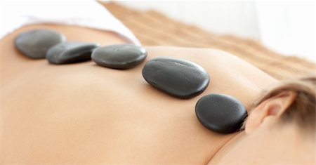simsearch:400-04192063,k - Close-up of a woman with hot stones on her back in a Spa center Stock Photo - Budget Royalty-Free & Subscription, Code: 400-04203654